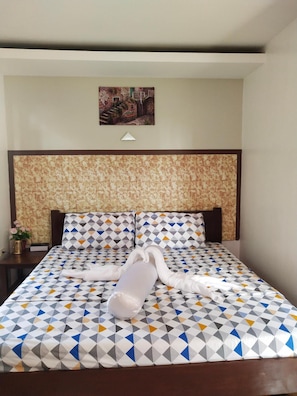 Hypo-allergenic bedding, down duvets, in-room safe
