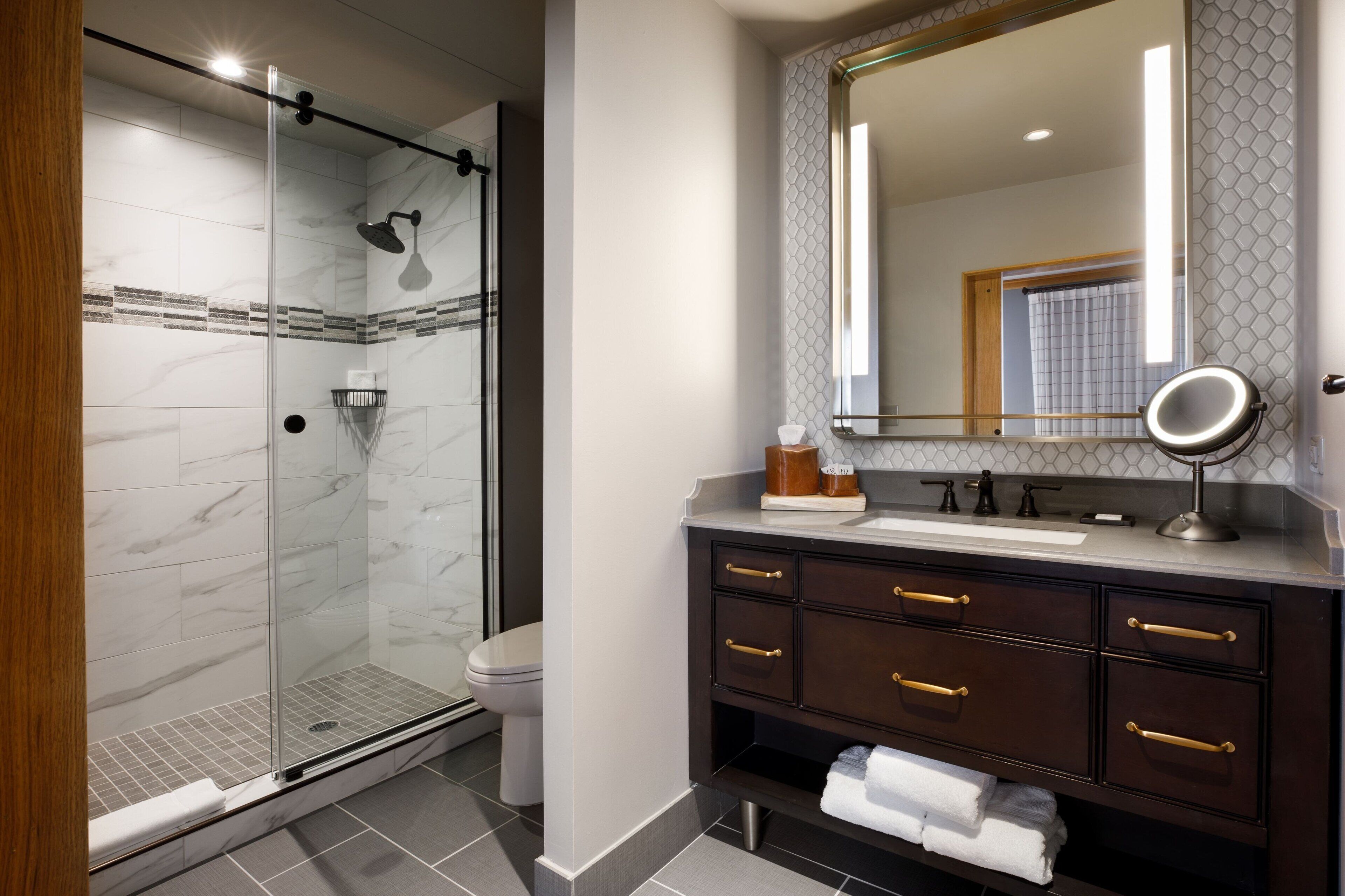 designer toiletries, hair dryer, bathrobes, towels