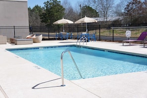 Seasonal outdoor pool, open 9:00 AM to 10:00 PM, sun loungers