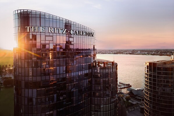 A modern high-rise hotel with a glass facade and the name "THE RITZ-CARLTON" prominently displayed. - The Ritz-Carlton, Perth (Perth)
