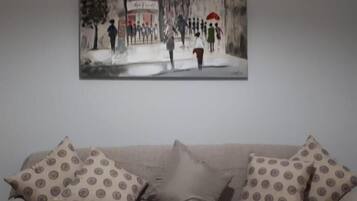 Apartment, 1 Bedroom | Living area | Flat-screen TV