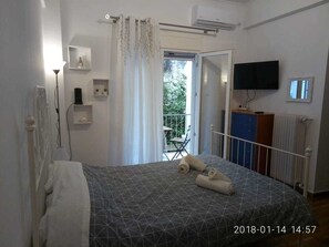 Apartment, 1 Bedroom | 1 bedroom, iron/ironing board, travel crib, free WiFi - Modern ideally located studio apartment (Athens)