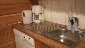 Cottage, 2 Bedrooms | Private kitchen | Fridge, oven, stovetop, coffee/tea maker