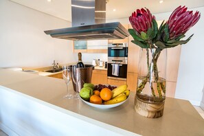Classic Apartment | Private kitchen | Full-sized fridge, microwave, oven, stovetop - 205 Pembroke (Cape Town)