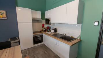 Executive Apartment, Ensuite | Restaurant