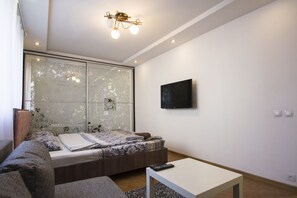 1 habitación, tabla de planchar con plancha, wifi gratis y ropa de cama 
