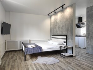 1 habitación, tabla de planchar con plancha, wifi gratis y ropa de cama 