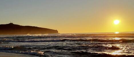 On the beach, sun loungers