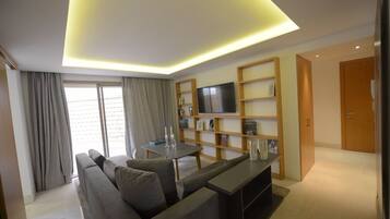 Classic Apartment | Living area | Flat-screen TV