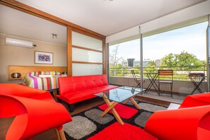 Apartment | Living area | 30-inch flat-screen TV with cable channels, TV