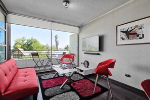 Apartment | Living area | 30-inch flat-screen TV with cable channels, TV