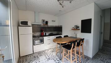 Double Room, Ground Floor | Private kitchen | Full-sized fridge, microwave, cookware/dishes/utensils