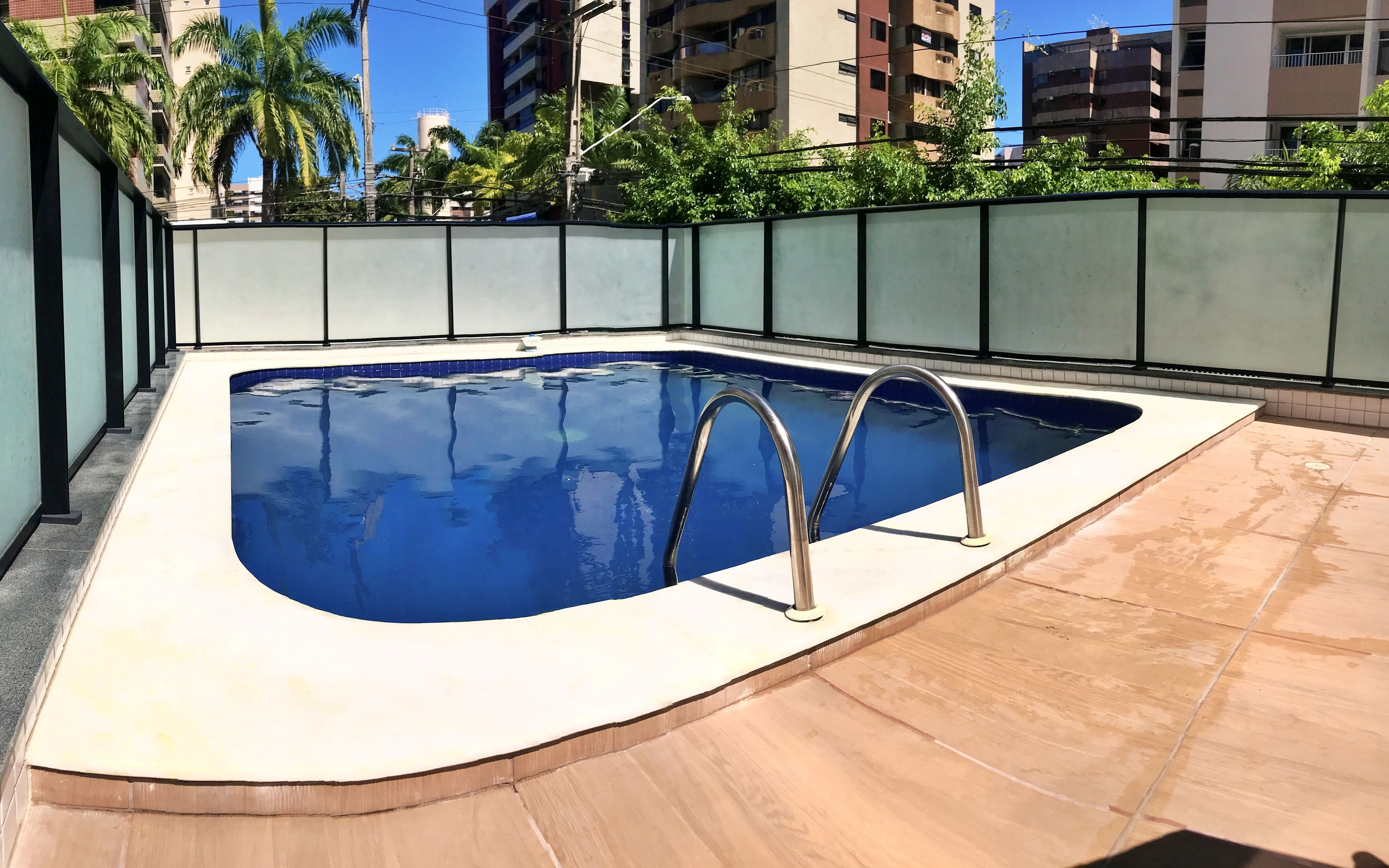 Outdoor pool, pool umbrellas, sun loungers