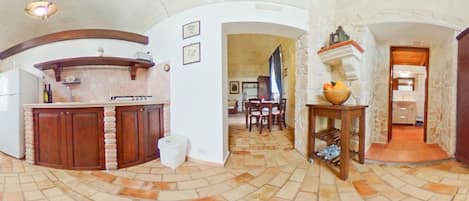 Fridge, coffee/tea maker, cookware/dishes/utensils