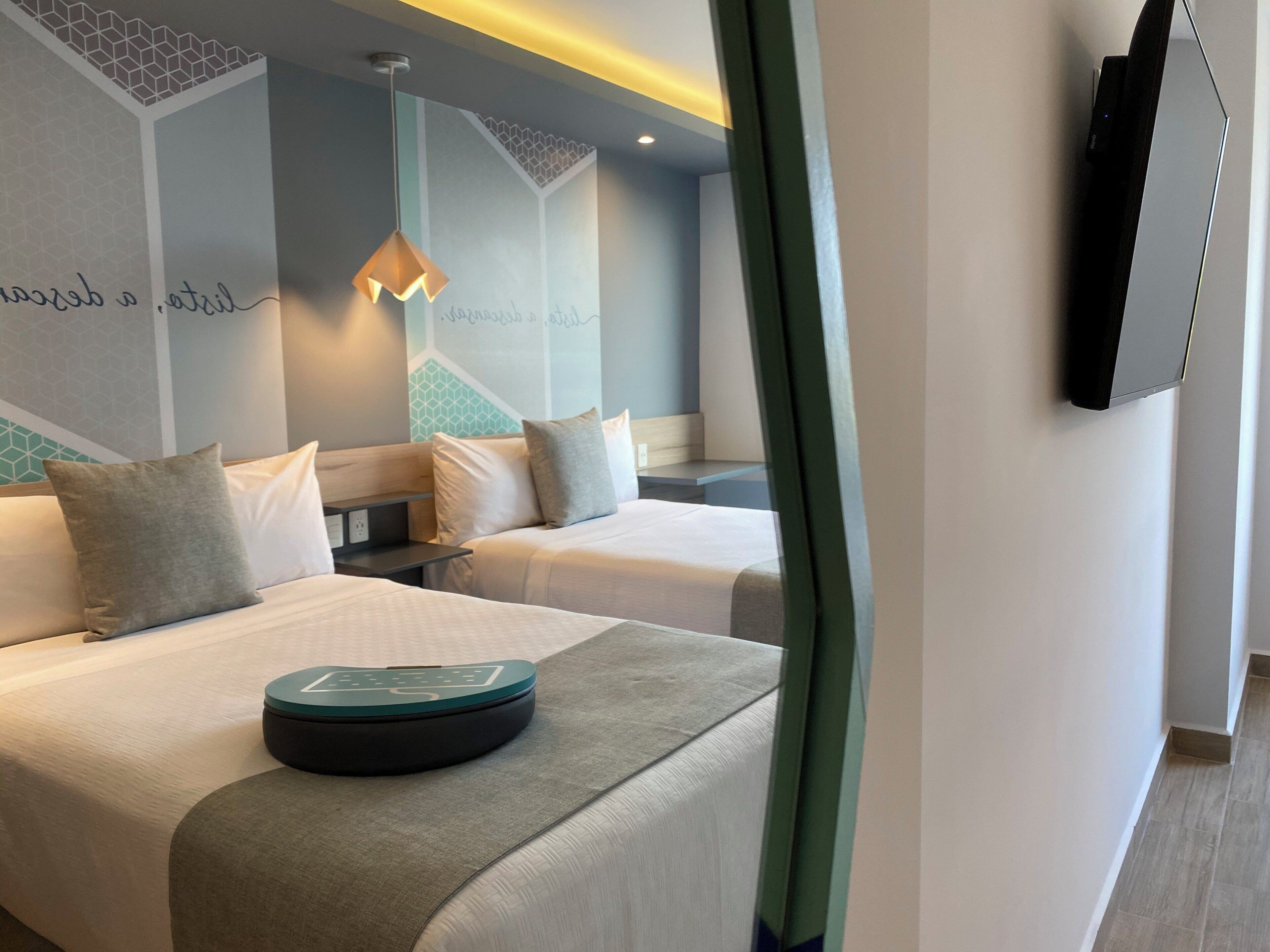 superior room, 2 double beds | in-room safe, desk, laptop workspace, blackout curtains