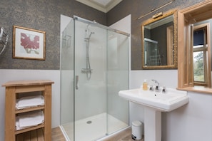 Bathtub, hair dryer, towels, soap