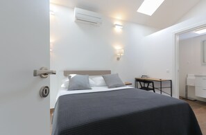2 dormitorios, tabla de planchar con plancha, wifi y ropa de cama