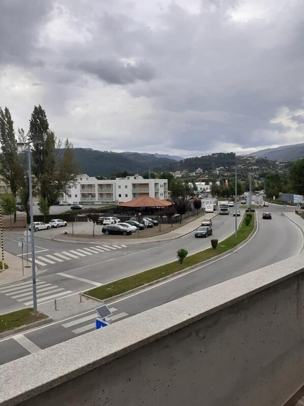 A multi-level parking structure with several cars parked. - Basto Vila Hotel (Cabeceiras de Basto)