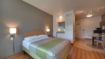 Escrivaninha, cortinas blackout, Wi-Fi de cortesia, roupa de cama