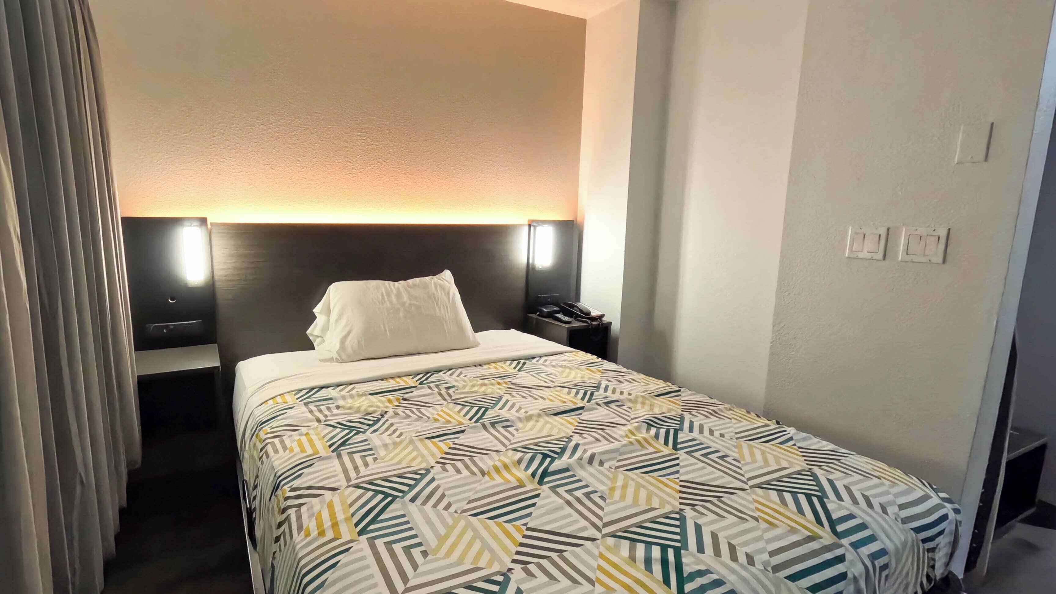 Desk, blackout curtains, free WiFi, bed sheets