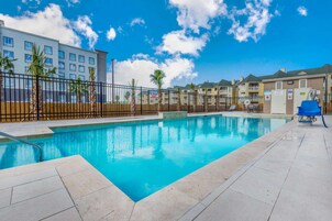 Outdoor pool, open 10:00 AM to 10:00 PM, pool umbrellas, sun loungers