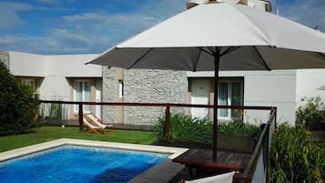 Seasonal outdoor pool, pool umbrellas, sun loungers