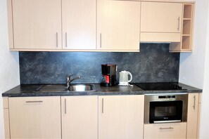 Fridge, microwave, dishwasher, coffee/tea maker