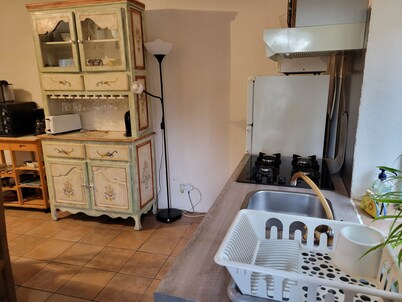 Cottage in the garden of the Moulin de la Fontaine