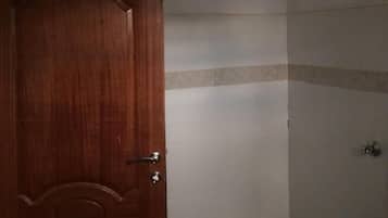 Shower, towels, soap, toilet paper