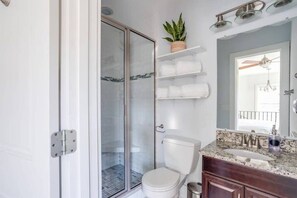 Shower, hair dryer, towels