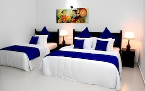 Deluxe Triple Room | 1 bedroom, premium bedding, in-room safe, individually decorated