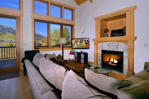 TV, fireplace, books, offices