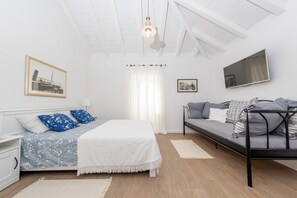 2 slaapkamers, een strijkplank/strijkijzer, wifi, beddengoed