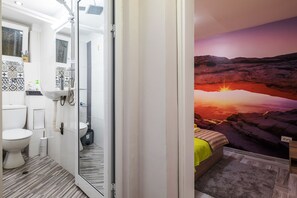 Hair dryer, towels, shampoo, toilet paper