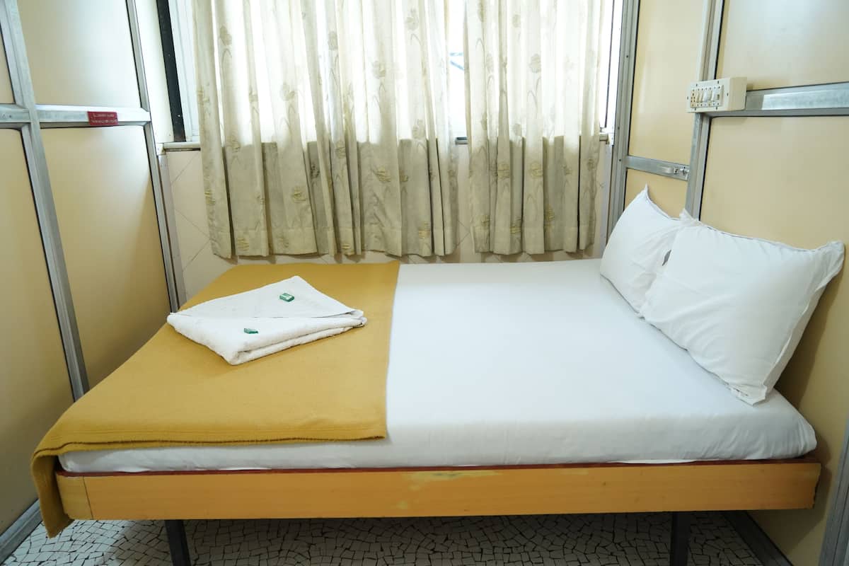Desk, blackout drapes, WiFi (free), bed sheets