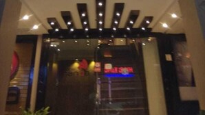 A hotel entrance with a sign reading "hotel nanda". - Hotel Nanda (Ludhiana)