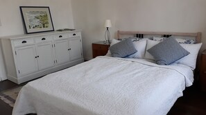 1 bedroom, desk, iron/ironing board, travel crib