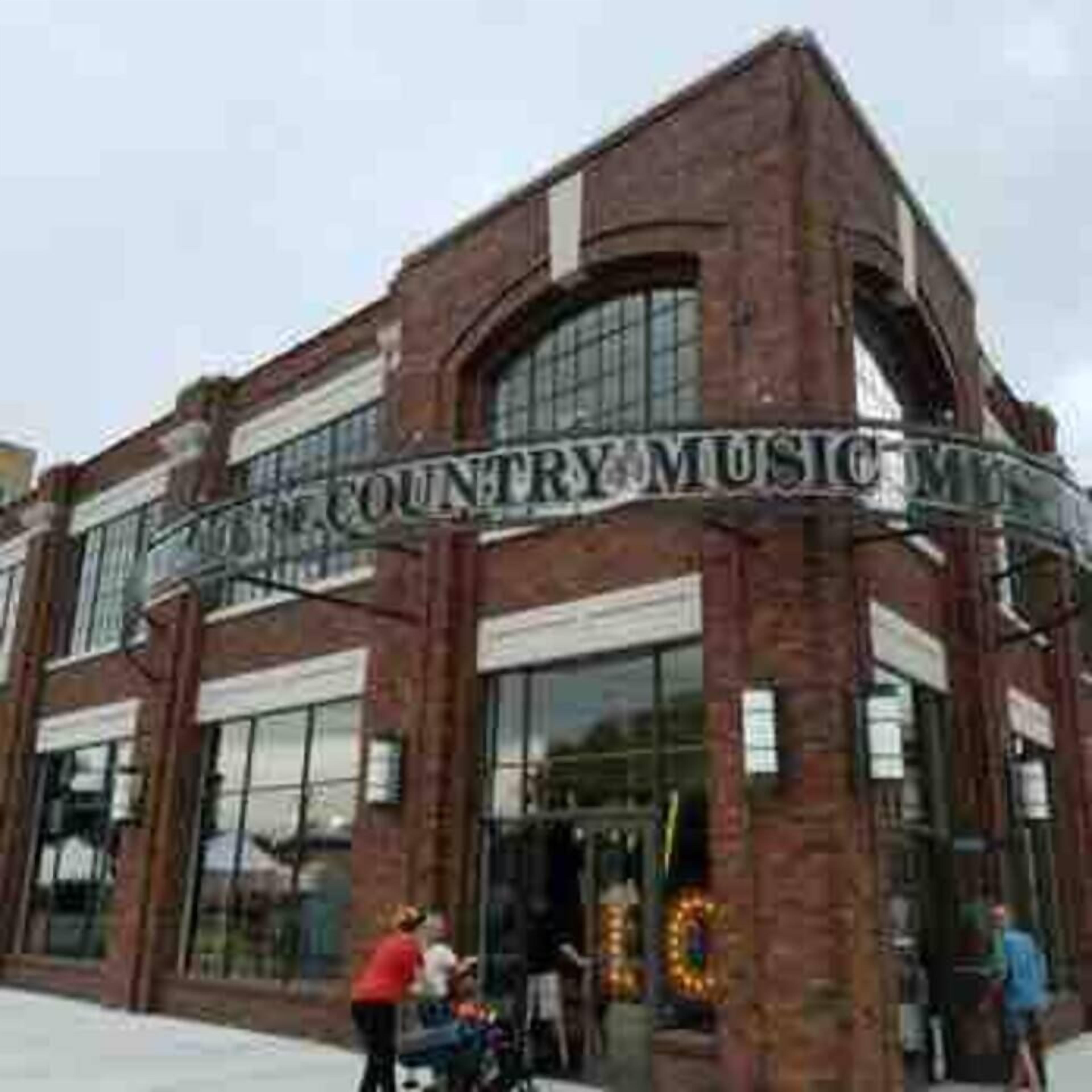A building with a sign that reads "COUNTRY MUSIC."