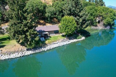 SERENE LAKEFRONT ESCAPE WITH PRIVATE BOAT RAMP AND LAKE & MOUNTAIN VIEWS