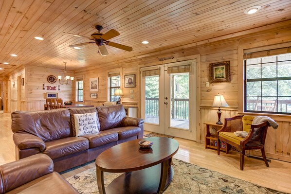 TV, fireplace, foosball, books - Pond-front cabin with private hot tub, fireplaces, furnished deck, & game room (Copperhill)