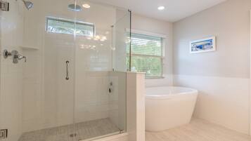 Combined shower/tub, hair dryer, towels, soap