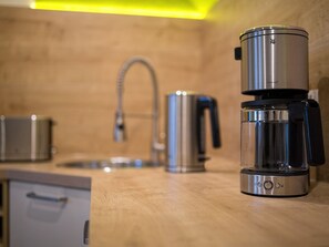 Kaffee und/oder Kaffeemaschine