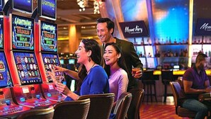 A casino with multiple slot machines and a bar area. - Awesome HotTub,Pool,Firepit,Jacuzzi,Ev Charger (long pond)