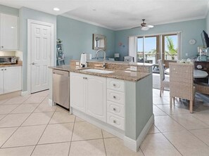 Coffee/tea maker, fridge, microwave, oven - Waterfront 2BR/2BA Marco Island condo with pool, WiFi and kitchen. (Marco Island)
