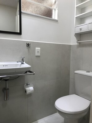 Shower, towels, soap, toilet paper