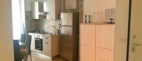Fridge, oven, stovetop, high chair