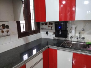 Fridge, microwave, stovetop, cookware/dishes/utensils