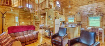 Bright three-level home with water views, jetted tub, firepit, and pool table