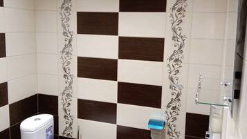 Shower, free toiletries, hair dryer, slippers