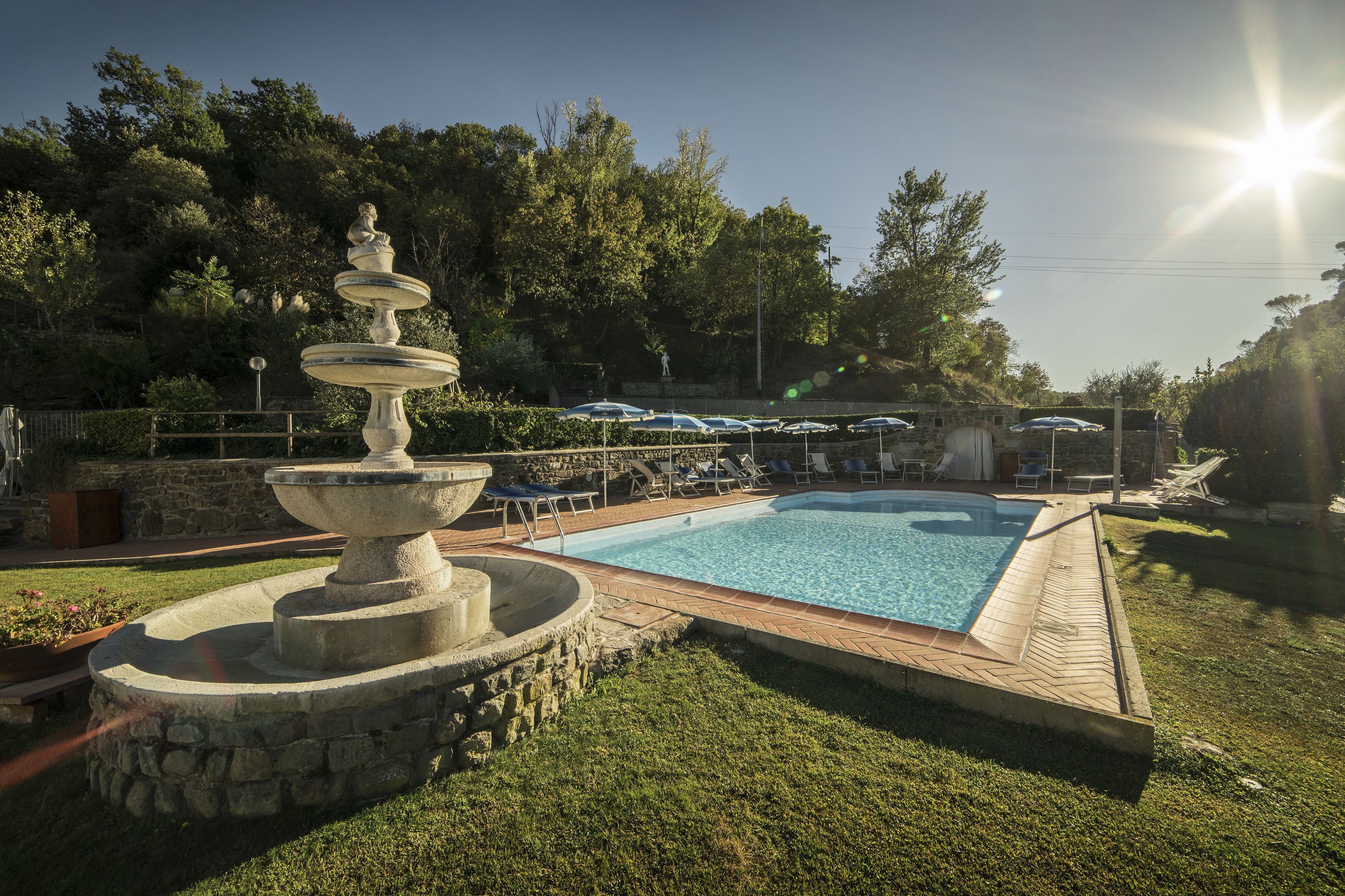 Seasonal outdoor pool, pool umbrellas, pool loungers